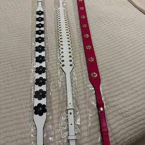 Three Michael Kors guitar strap handbag straps